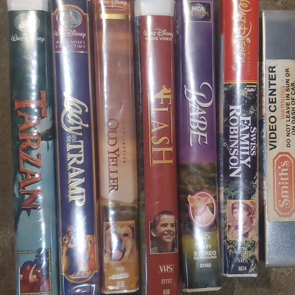 Vhs collection. Tarzan, lady snd the tramp old yeller flash babe swiss family